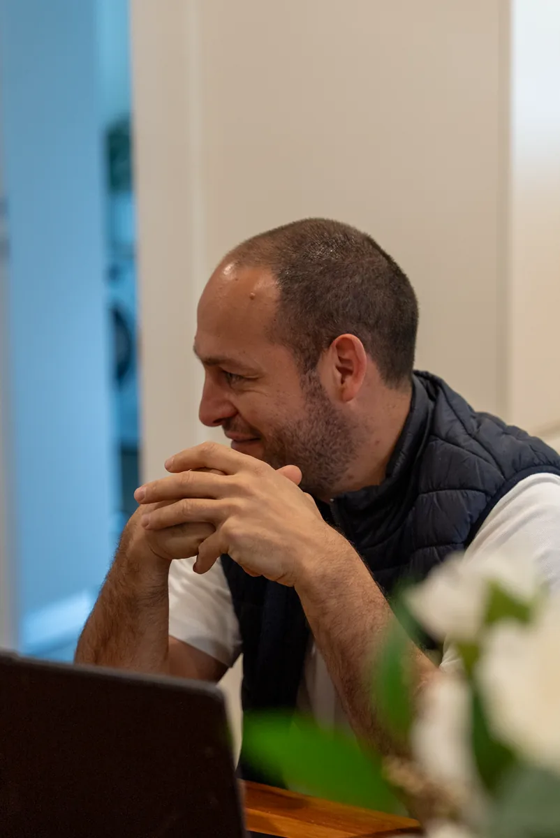 Dom, licensed builder and owner of Package Deal Bathrooms, walking a client through a bathroom design